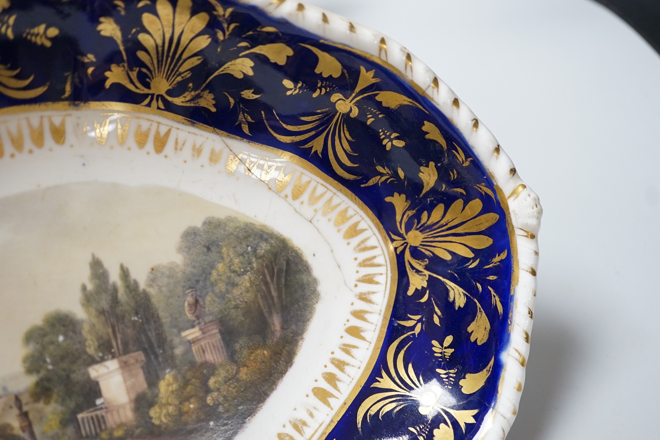 A small group of late 18th and 19th century Derby porcelain including bough pot, 23cm wide, dishes, plates, lidded pot and stand